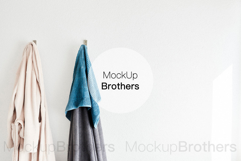 Bathroom wall mockup with towels by mockup brothers