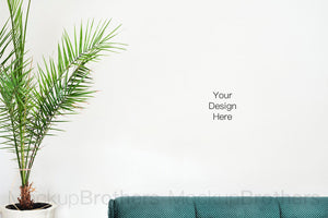 Blank wall mockup with sofa and palm tree