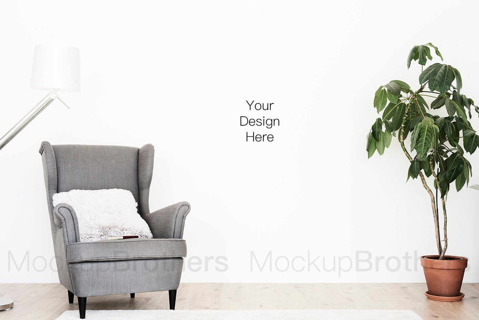 Wall art mockup with chair by Mock Up Brothers
